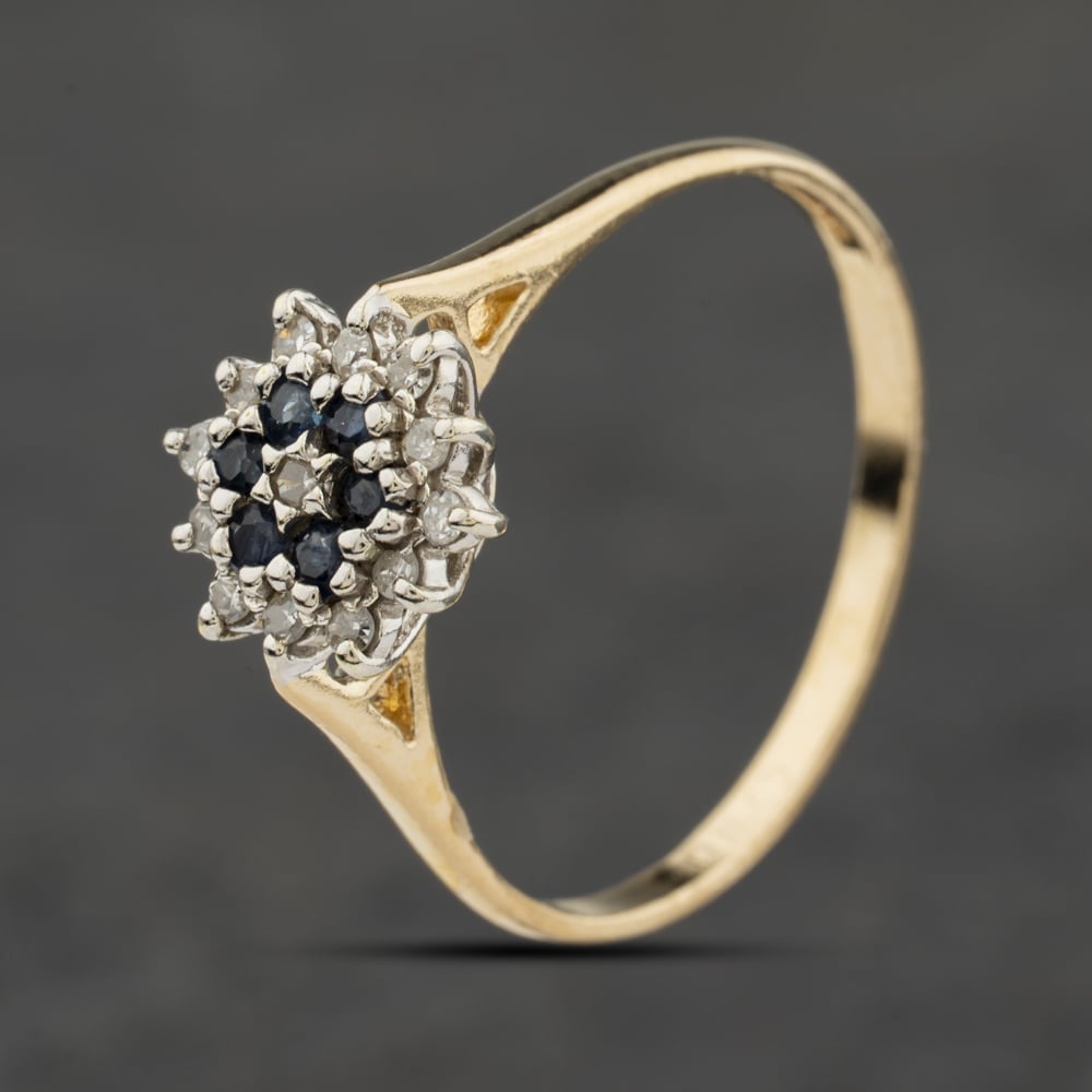 Click to view product details and reviews for Pre Owned 9ct Yellow Gold Sapphire And 013ct Diamond Flower Cluster Ring 41384037.