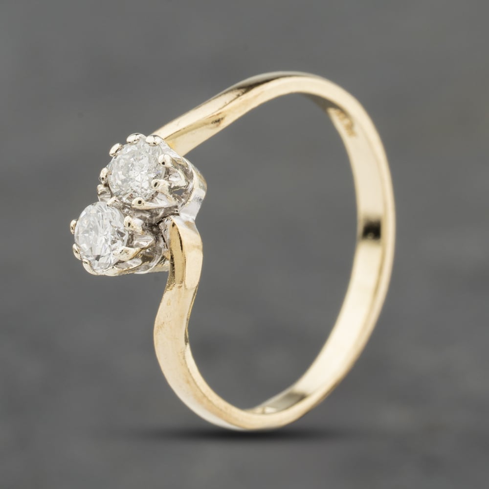Click to view product details and reviews for Pre Owned 9ct Yellow Gold 030ct Brilliant Cut Diamond Twist Two Stone Ring 41384078. Click to view product details and reviews for Pre Owned 9ct Yellow Gold 030ct Brilliant Cut Diamond Twist Two Stone Ring 41384078.