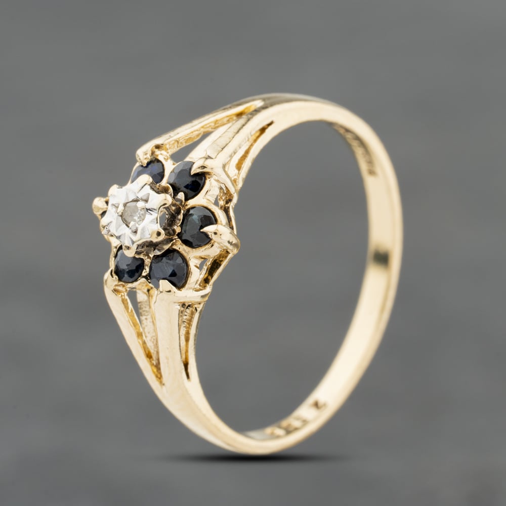 Click to view product details and reviews for Pre Owned 9ct Yellow Gold Sapphire And 001ct Diamond Flower Cluster Ring 41384111. Click to view product details and reviews for Pre Owned 9ct Yellow Gold Sapphire And 001ct Diamond Flower Cluster Ring 41384111.