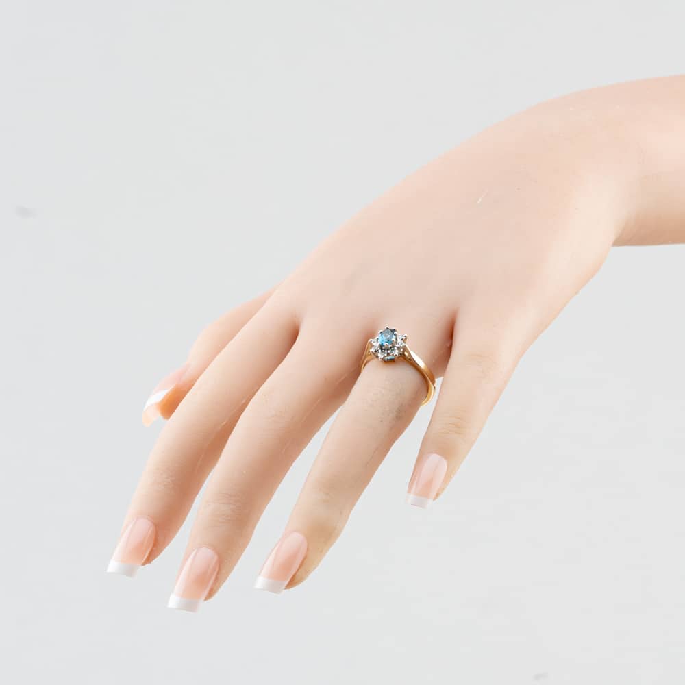 Pre-Owned 9ct Yellow Gold Blue Topaz & 0.08ct Diamond Oval Cluster Ring 41384897