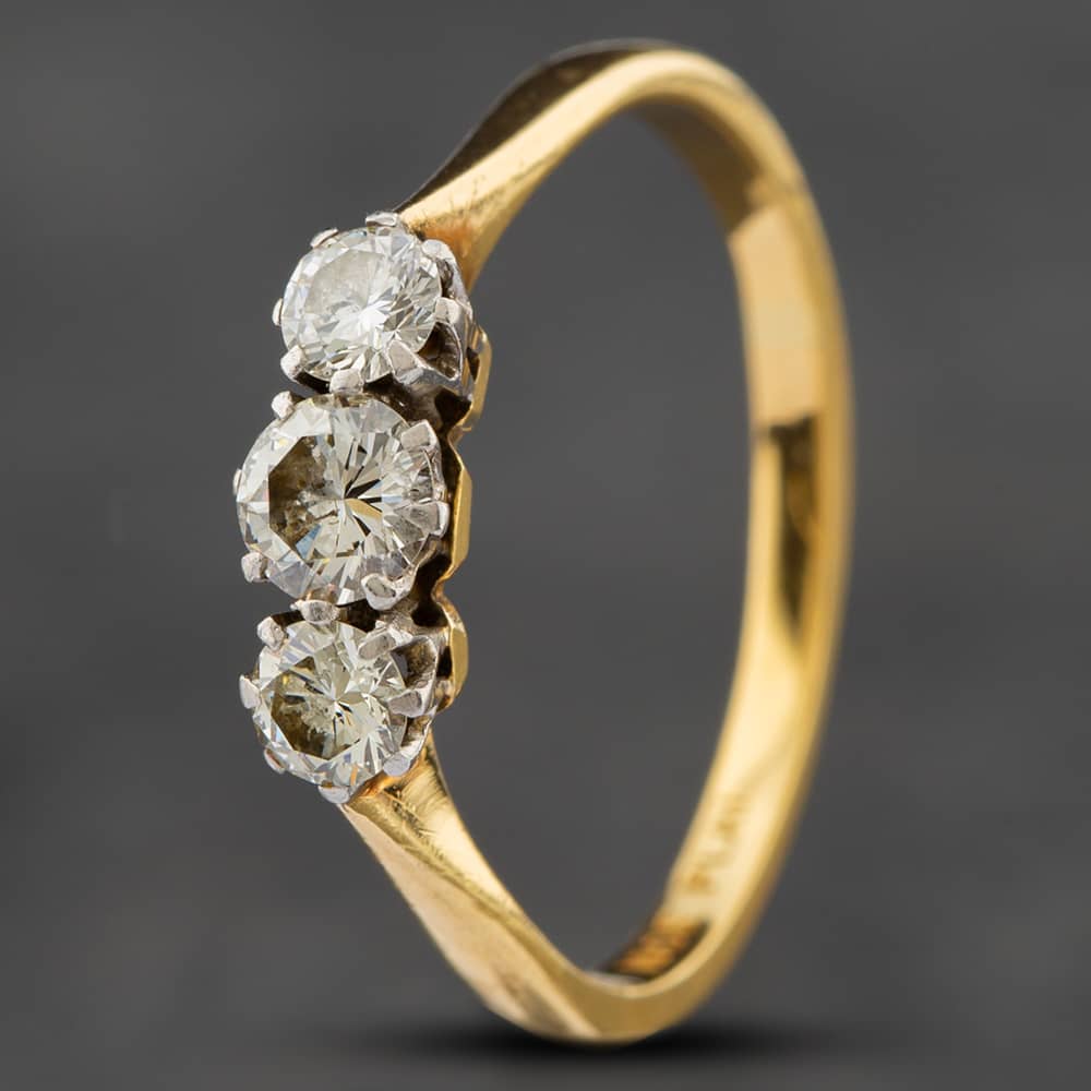 Product photograph of Pre-owned Vintage Yellow Gold Brilliant Cut Diamond Three Stone Ring 41481159 from The Jewel Hut