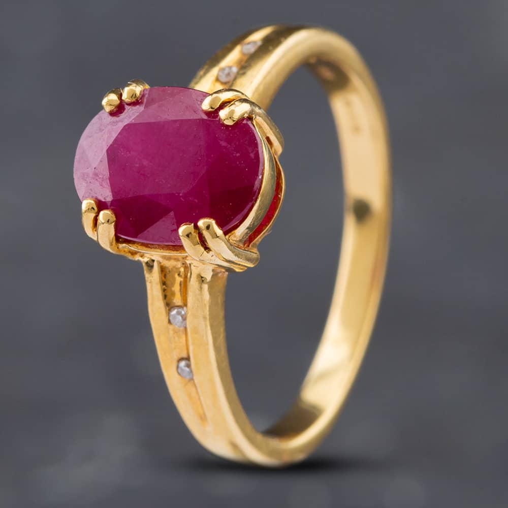 Product photograph of Pre-owned 18ct Yellow Gold Oval Cut Ruby Dress Ring 41481457 from The Jewel Hut