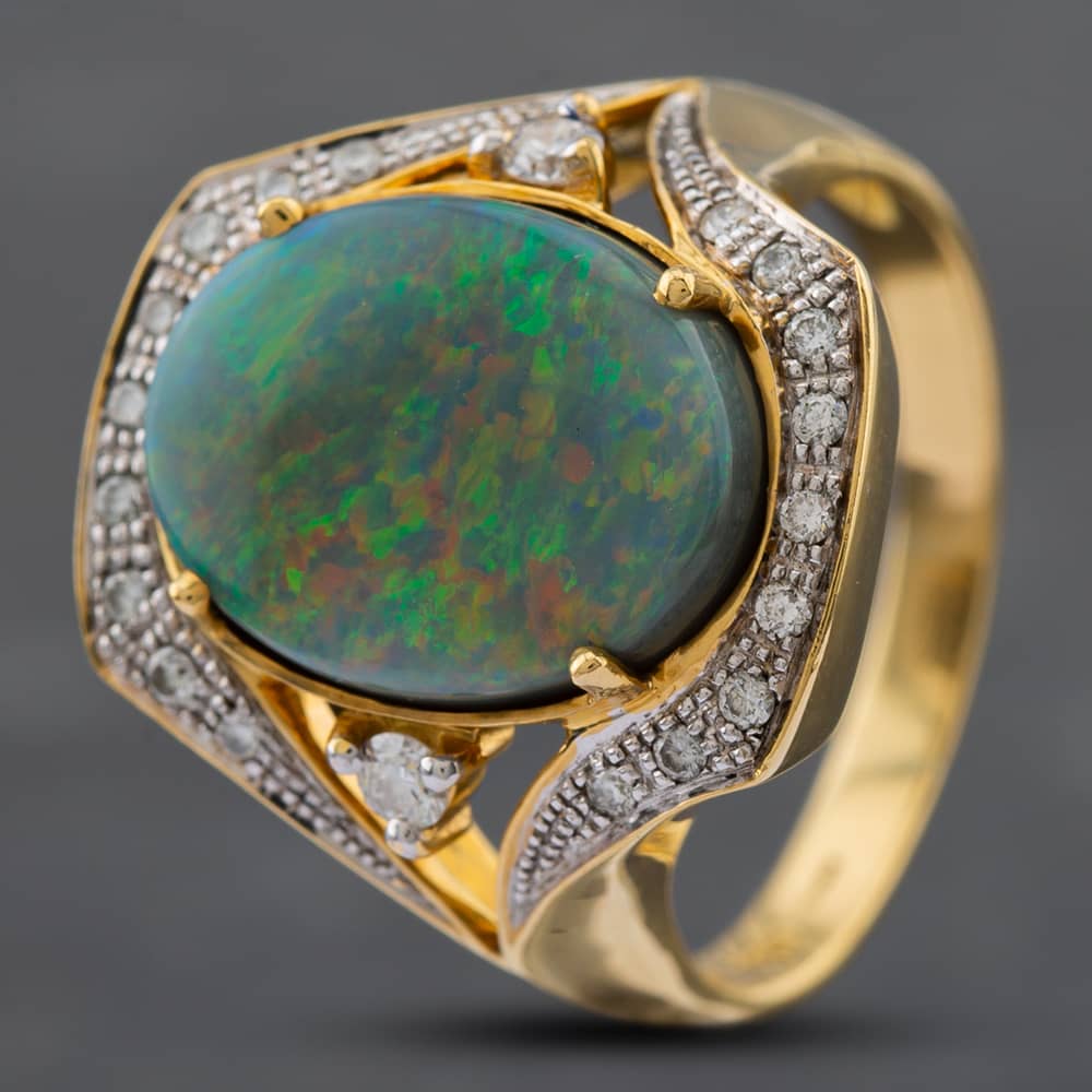 Product photograph of Pre-owned 18ct Yellow Gold Opal Amp Brilliant Cut Diamond Cluster Ring 41481597 from The Jewel Hut