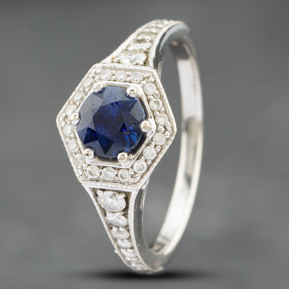 Product photograph of Pre-owned 18ct White Gold Sapphire Amp Diamond Cluster Ring 41481607 from The Jewel Hut