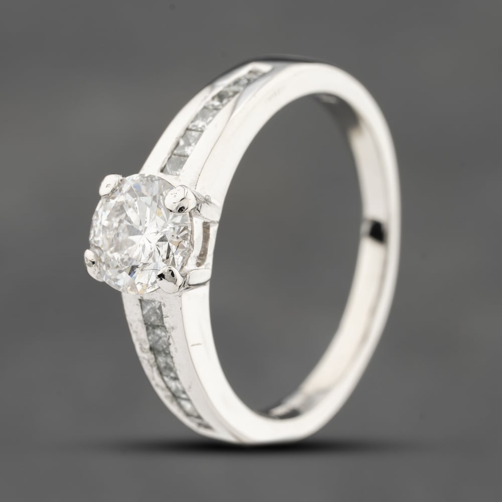 Click to view product details and reviews for Pre Owned Platinum 075ct Brilliant Cut Diamond Shoulder Set Solitaire Ring 41481710.