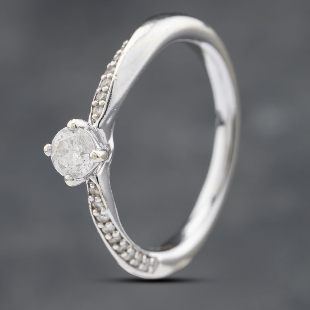 Click to view product details and reviews for Pre Owned 9ct White Gold 020ct Brilliant Cut Diamond Shoulder Set Solitaire Ring 41481712. Click to view product details and reviews for Pre Owned 9ct White Gold 020ct Brilliant Cut Diamond Shoulder Set Solitaire Ring 41481712.