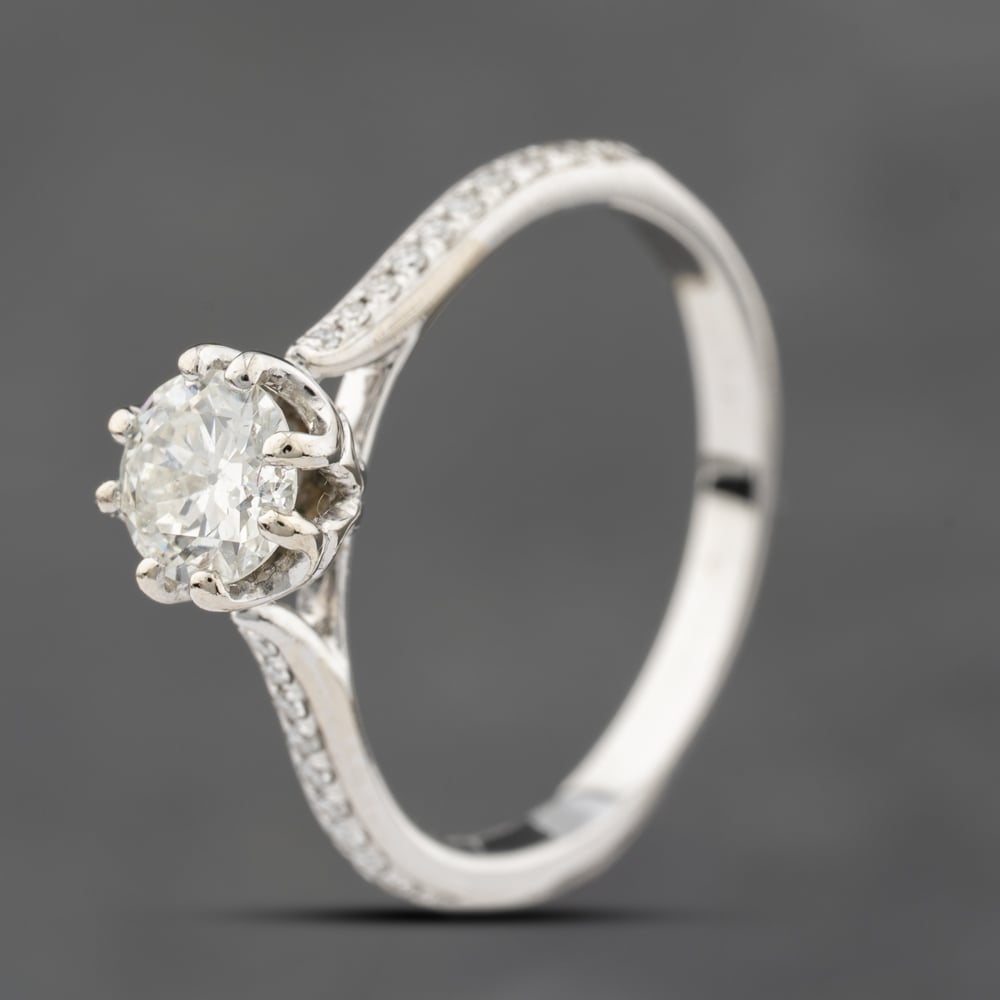 Click to view product details and reviews for Pre Owned 18ct White Gold 050ct Brilliant Cut Diamond Shoulder Set Solitaire Ring 41481713.