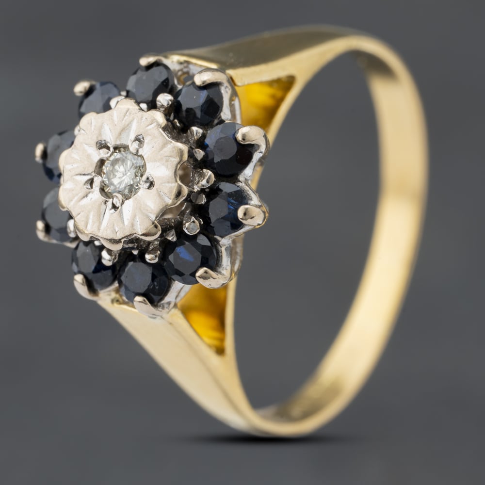 Click to view product details and reviews for Pre Owned Vintage 18ct Yellow Gold Sapphire And Brilliant Cut Diamond Round Cluster Ring 41481815. Click to view product details and reviews for Pre Owned Vintage 18ct Yellow Gold Sapphire And Brilliant Cut Diamond Round Cluster Ring 41481815.