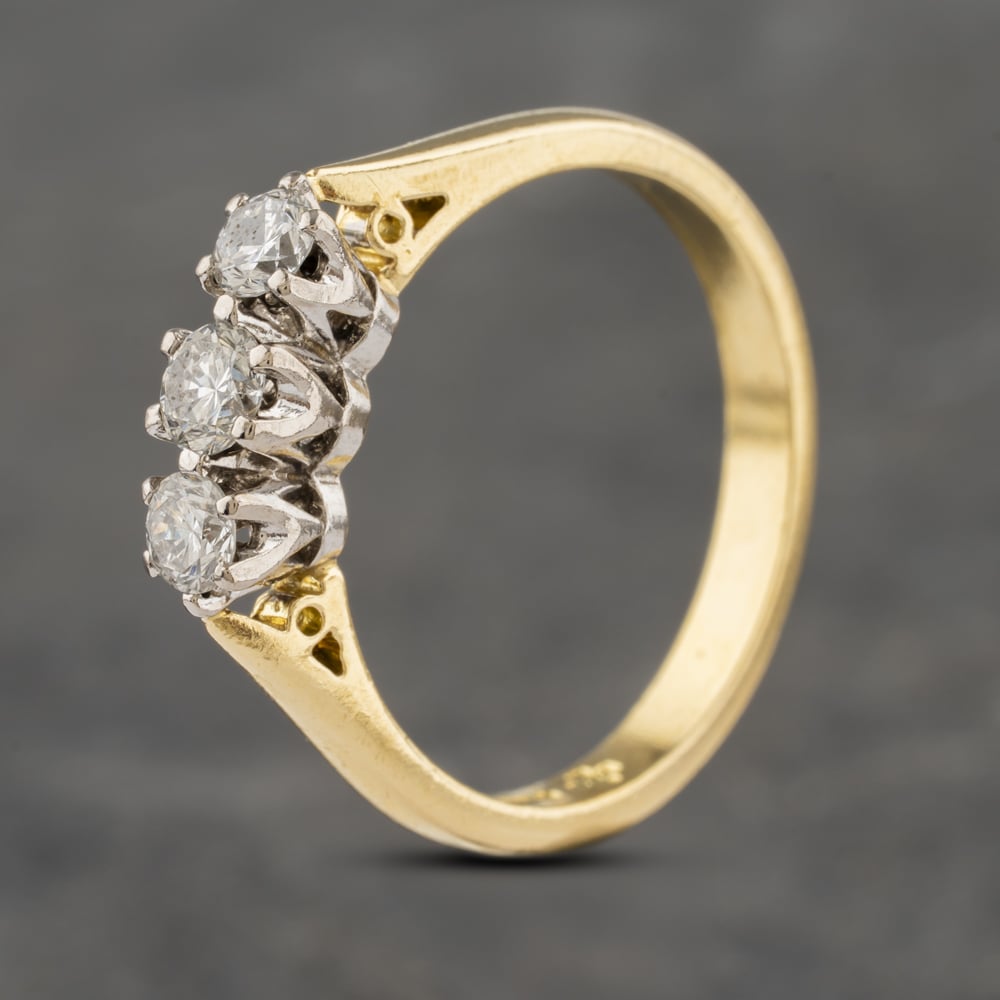 Click to view product details and reviews for Pre Owned 18ct Yellow Gold 050ct Brilliant Cut Diamond Three Stone Ring 41482053.