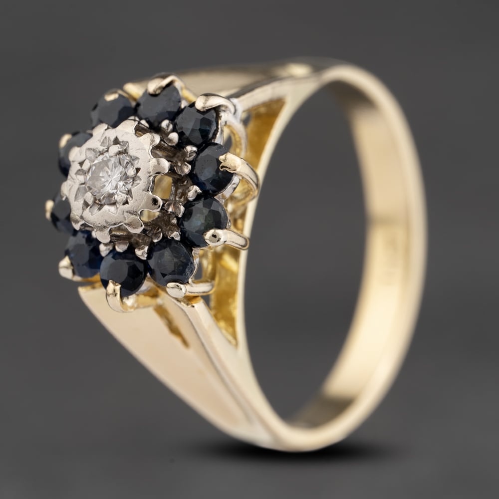 Click to view product details and reviews for Pre Owned 18ct Yellow Gold Sapphire And 010ct Diamond Cluster Ring 41482066.