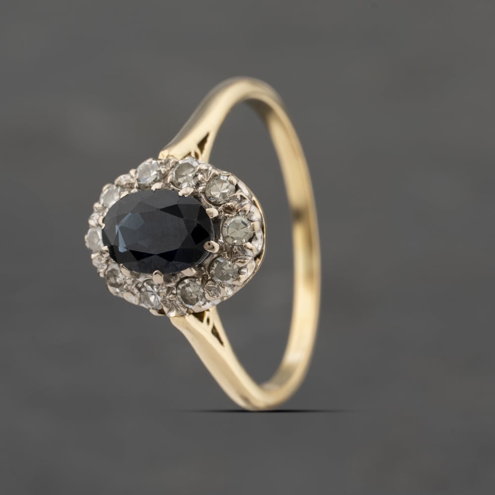 Click to view product details and reviews for Pre Owned 18ct Yellow Gold Sapphire And 030ct Diamond Oval Cluster Ring 41482119. Click to view product details and reviews for Pre Owned 18ct Yellow Gold Sapphire And 030ct Diamond Oval Cluster Ring 41482119.