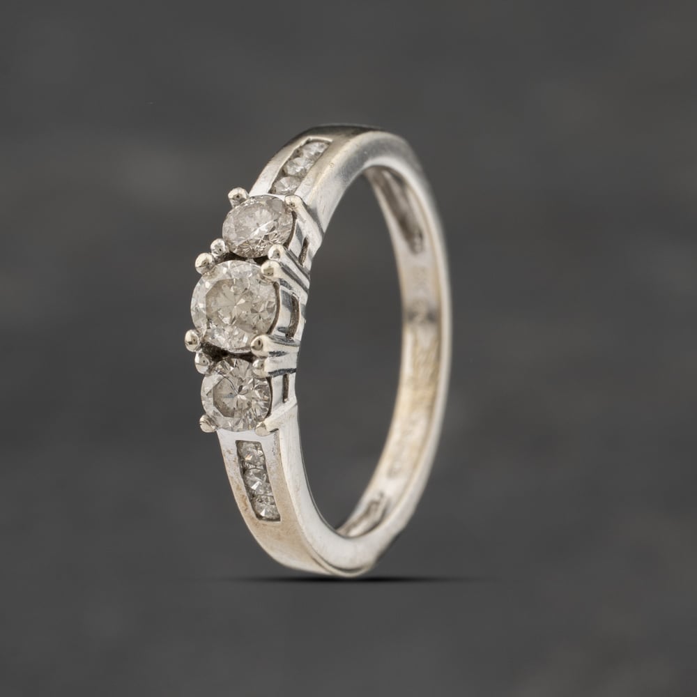 Click to view product details and reviews for Pre Owned 9ct White Gold 050ct Diamond With Diamond Set Shoulders Three Stone Ring 41482135. Click to view product details and reviews for Pre Owned 9ct White Gold 050ct Diamond With Diamond Set Shoulders Three Stone Ring 41482135.