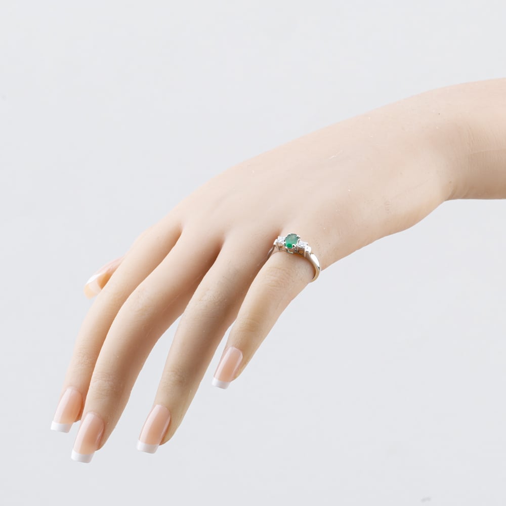 Pre-Owned 18ct White Gold Emerald & 0.20ct Princess Cut Diamond Oval Three Stone Ring 41482245