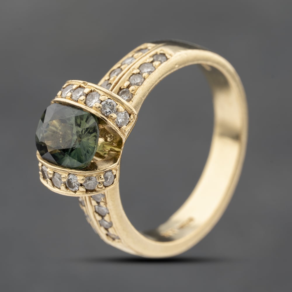 Click to view product details and reviews for Pre Owned 14ct Yellow Gold Green Sapphire And 045ct Diamond Dress Ring 41482287.