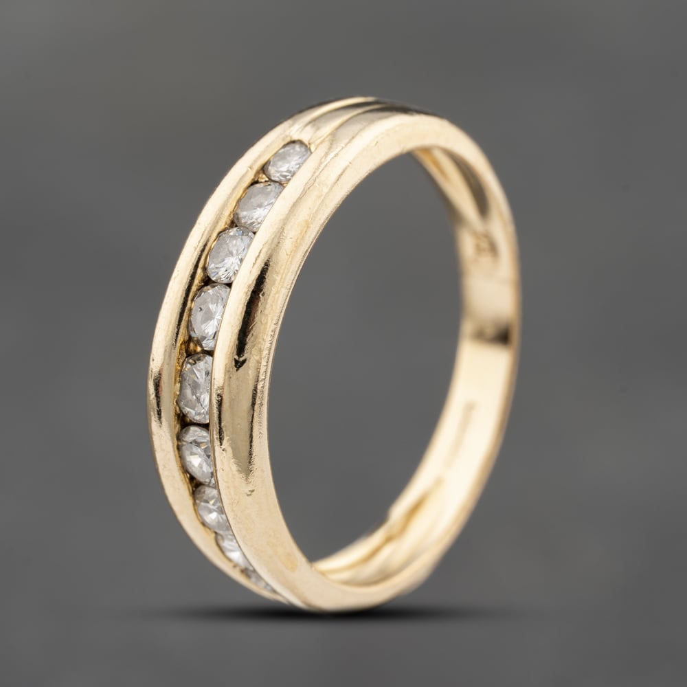 Click to view product details and reviews for Pre Owned 18ct Yellow Gold Brilliant Cut Diamond Channel Set Half Eternity Ring 41482310.