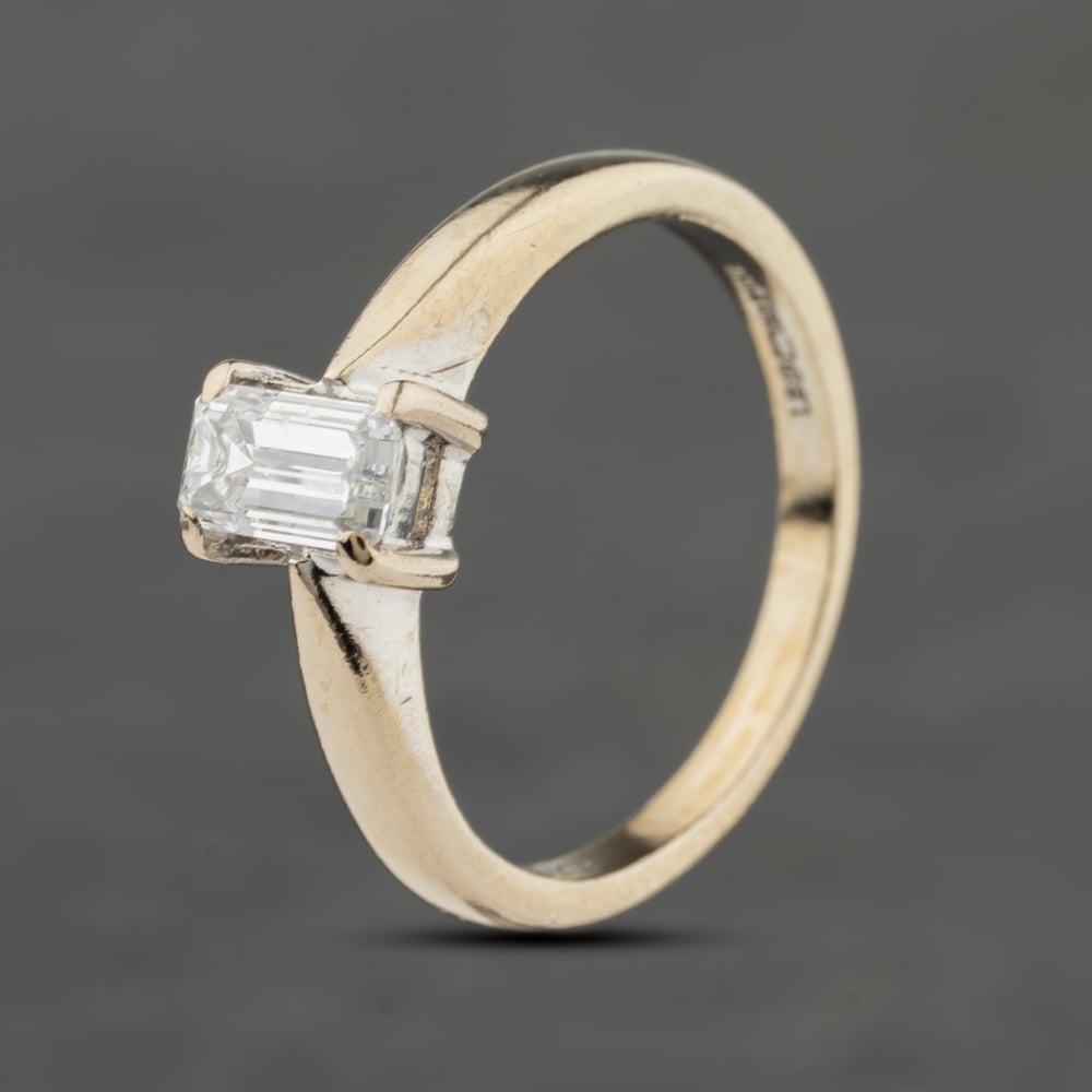 Click to view product details and reviews for Pre Owned 18ct White Gold 050ct Emerald Cut Diamond Solitaire Ring 41482480.