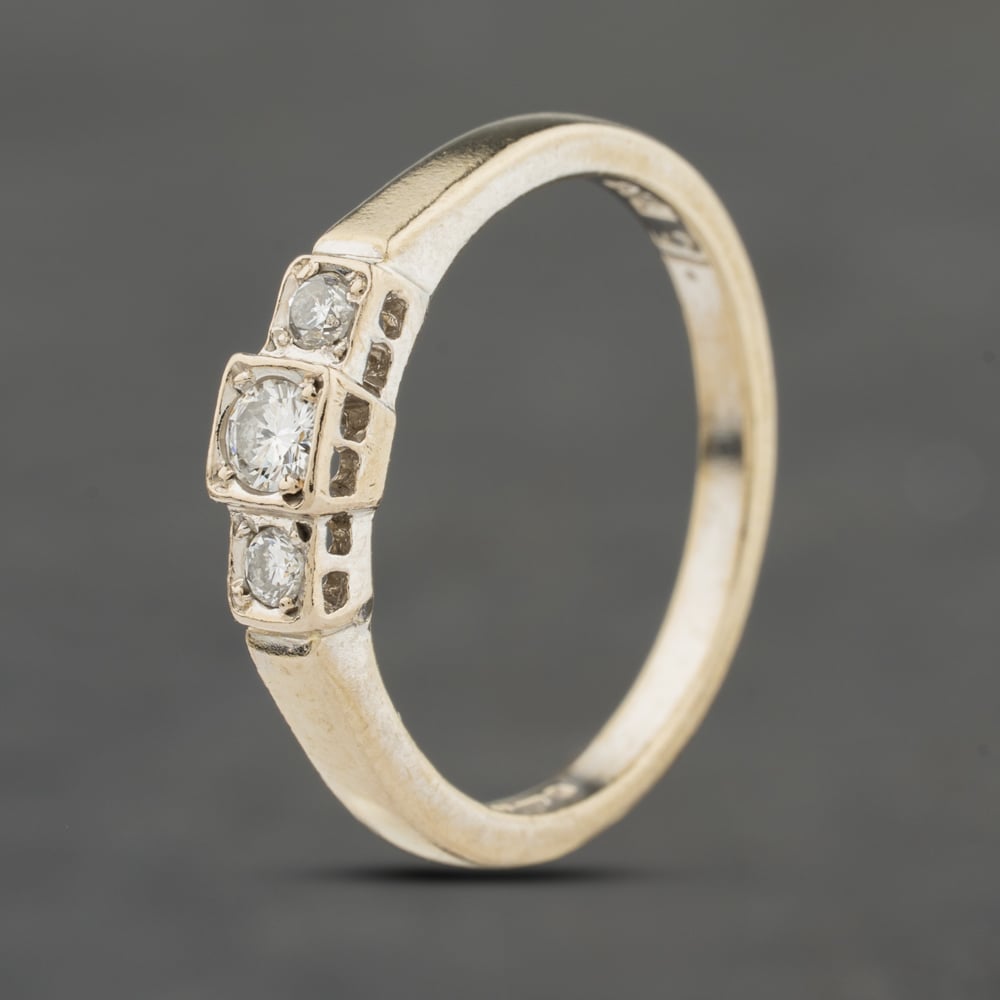 Click to view product details and reviews for Pre Owned 18ct White Gold 015ct Brilliant Cut Diamond Square Set Three Stone Ring 41482485.