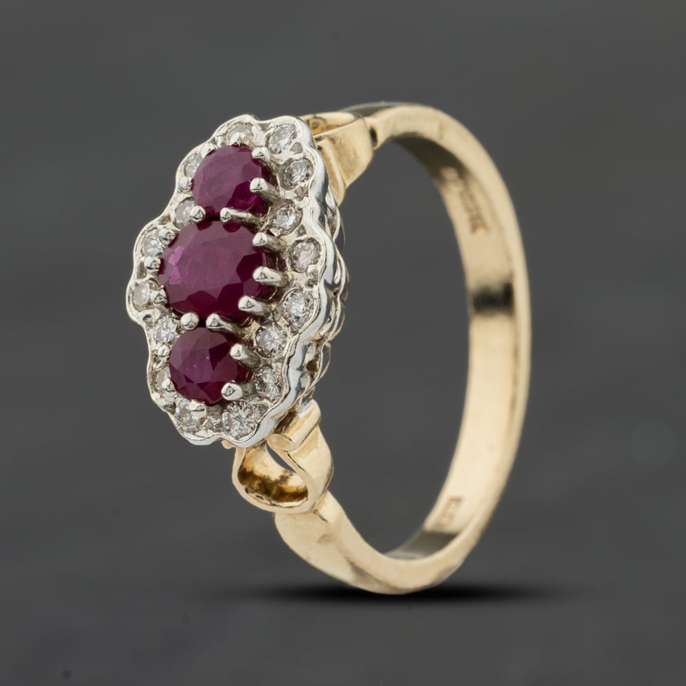 Click to view product details and reviews for Pre Owned 9ct Yellow Gold Ruby And 024ct Brilliant Cut Diamond Boat Cluster Ring 41482509.