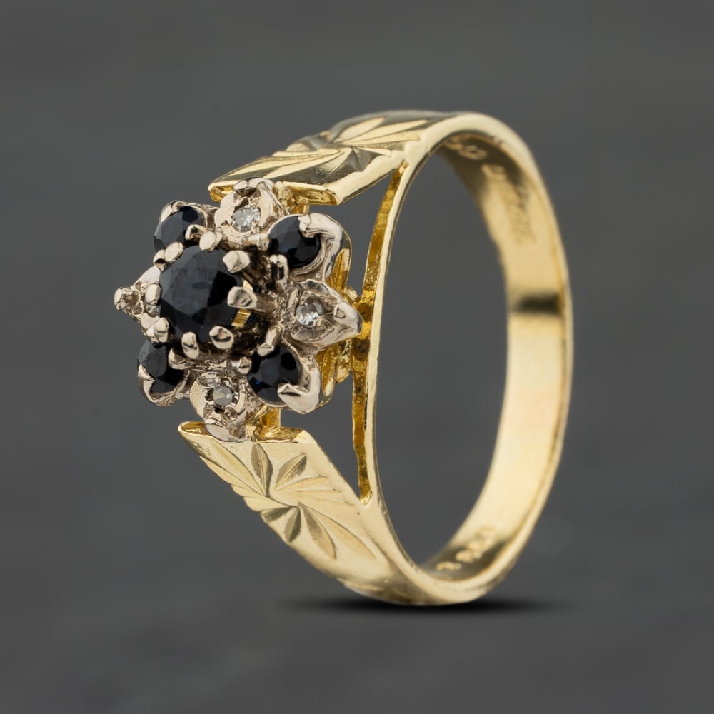 Click to view product details and reviews for Pre Owned 18ct Yellow Gold Sapphire And 004ct Diamond Flower Cluster Ring 41482520. Click to view product details and reviews for Pre Owned 18ct Yellow Gold Sapphire And 004ct Diamond Flower Cluster Ring 41482520.
