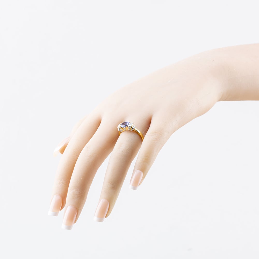 Pre-Owned 18ct Yellow Gold Tanzanite & 0.22ct Brilliant Cut Diamond Oval Dress Ring 41482756