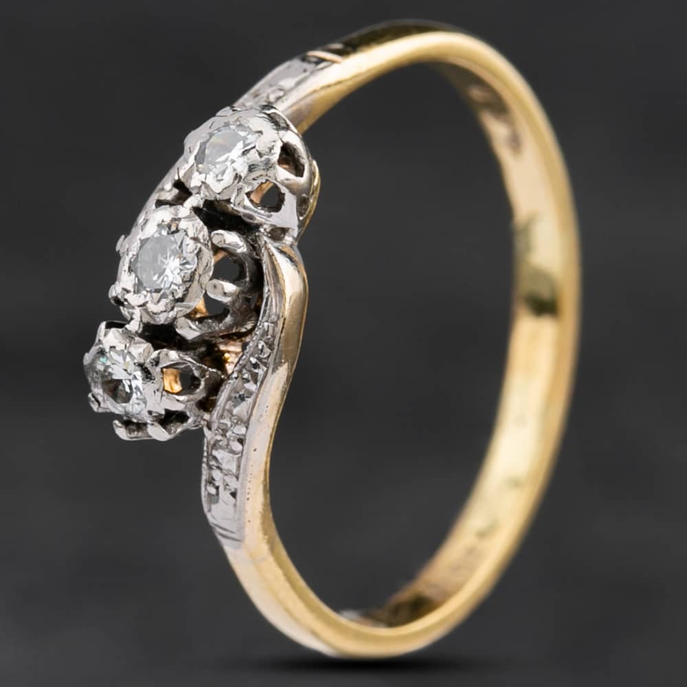 Product photograph of Pre-owned Vintage Mixed Metal Diamond Crossover Three Stone Ring 4158446 from The Jewel Hut
