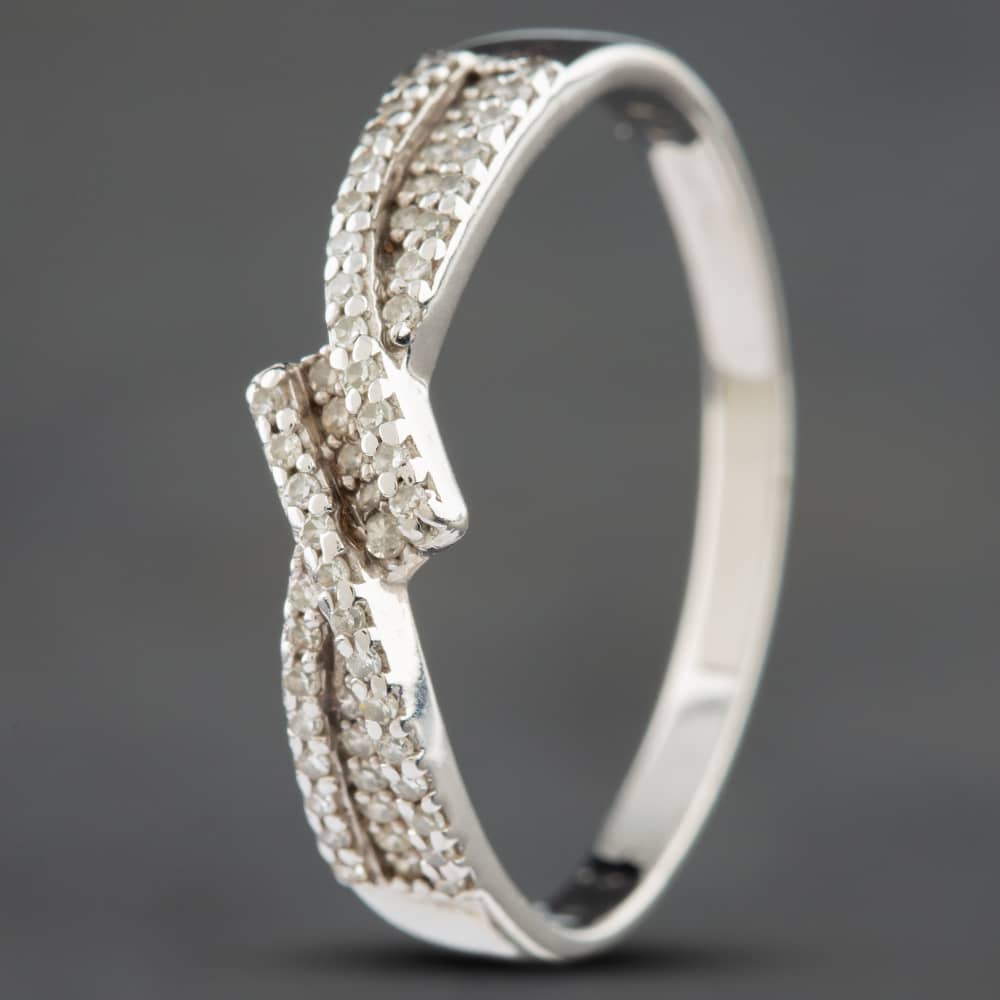 Product photograph of Pre-owned 9ct White Gold Brilliant Cut Diamond Three Row Crossover Ring 415858233 from The Jewel Hut