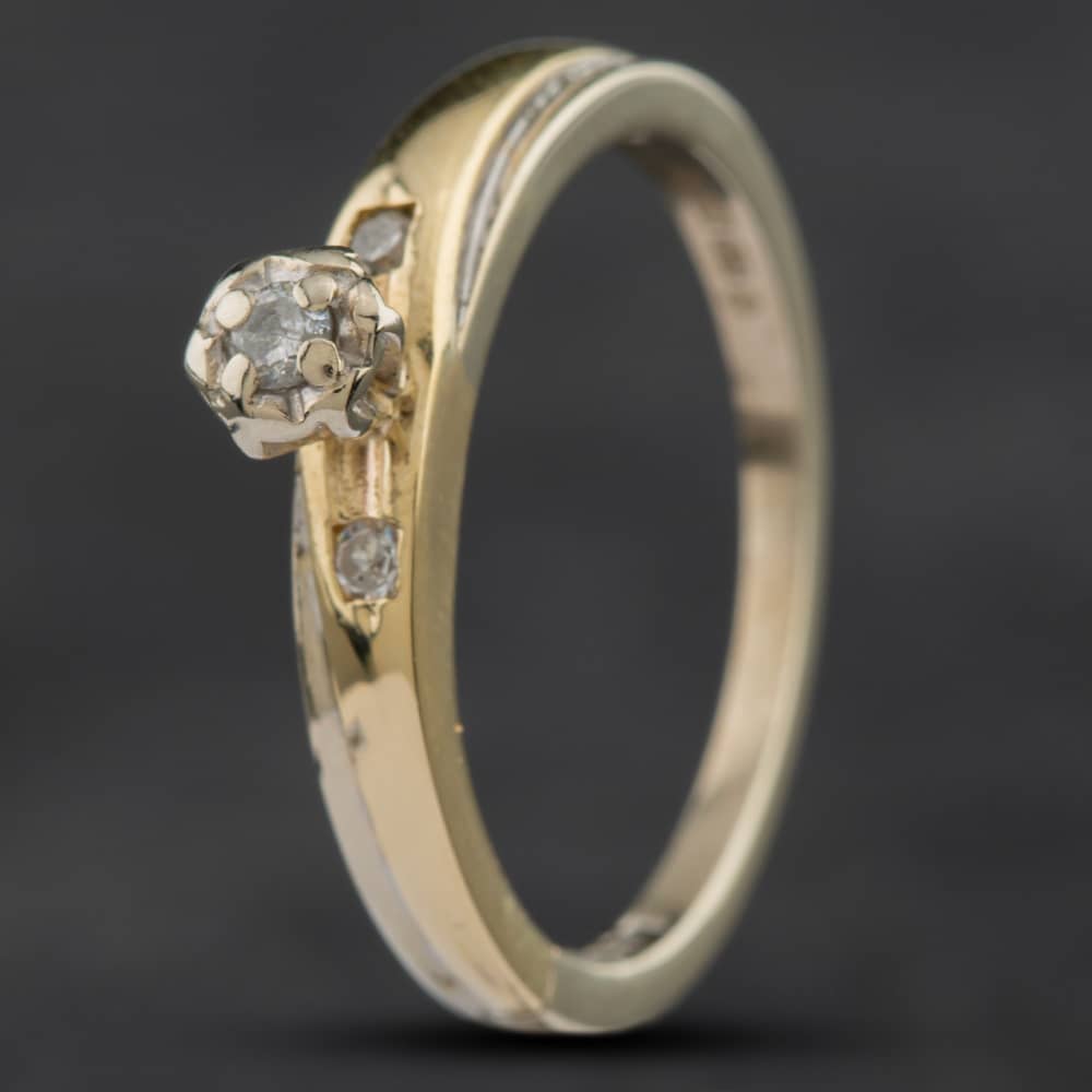 Product photograph of Pre-owned 9ct Two Colour Gold 0 09ct Brilliant Cut Diamond Solitaire Ring 4158625 from The Jewel Hut