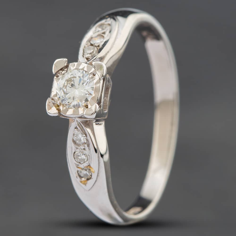 Product photograph of Pre-owned 9ct Yellow Gold 0 20ct Brilliant Cut Diamond Shoulder Set Solitaire Ring 4158986 from The Jewel Hut