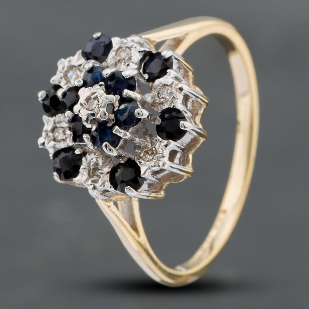 Product photograph of Pre-owned 9ct Yellow Gold Sapphire Amp Single Cut Diamond Cluster Ring 41671427 from The Jewel Hut