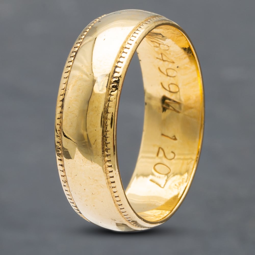 Product photograph of Pre-owned 18ct Yellow Gold Milgrain Edge 6mm Patterned Wedding Ring 41871353 from The Jewel Hut