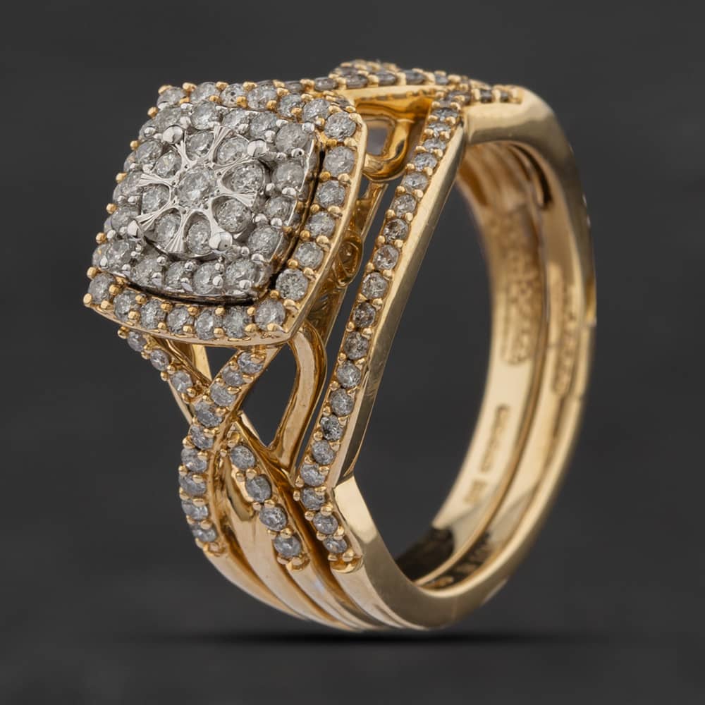 Product photograph of Pre-owned 9ct Yellow Gold 0 65ct Brilliant Cut Diamond Bridal Set Ring 43121052 from The Jewel Hut