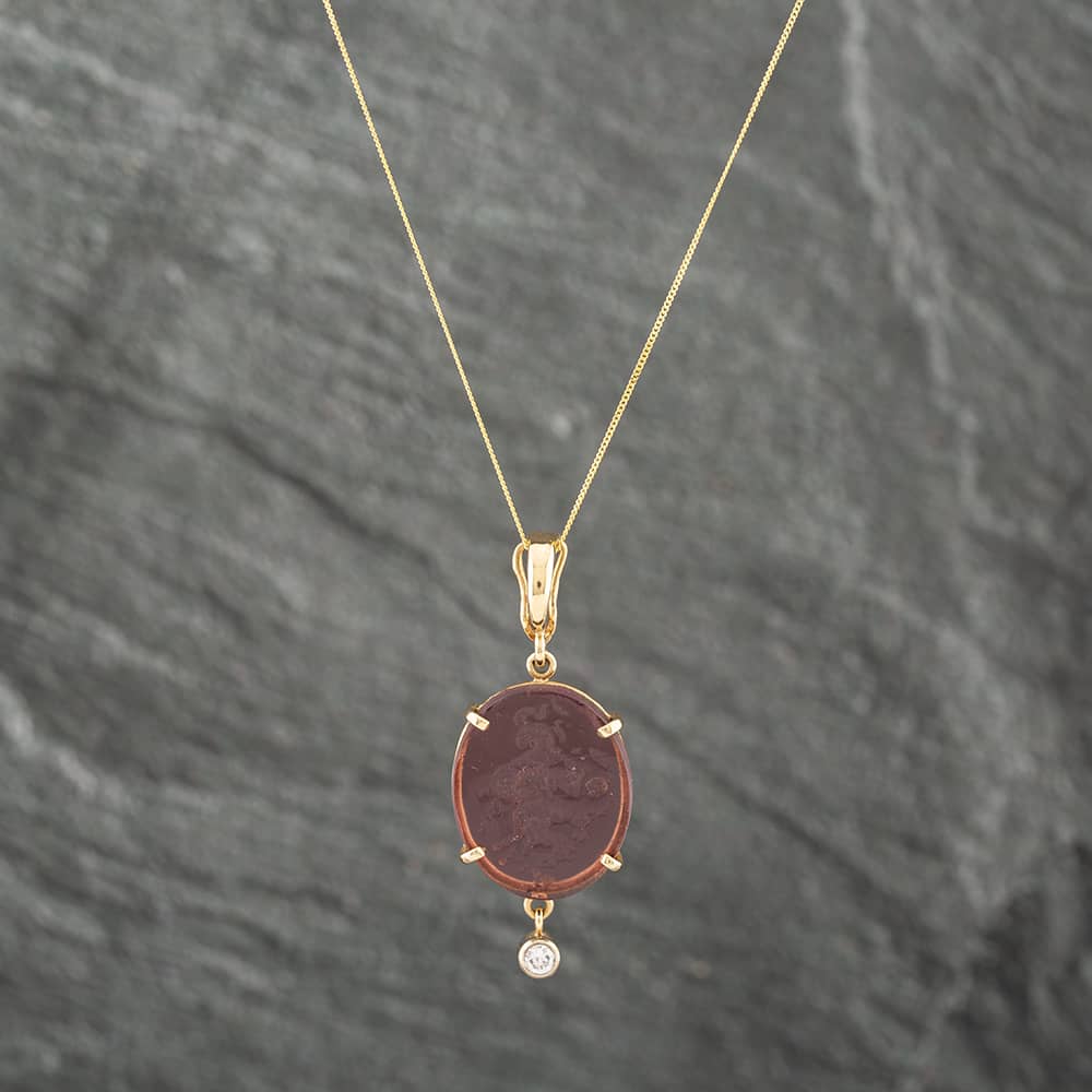 Product photograph of Pre-owned 14ct Yellow Gold Purple Glass Amp Brilliant Cut Diamond Oval Pendant Amp 18 Inch Curb Chain 43141124 from The Jewel Hut