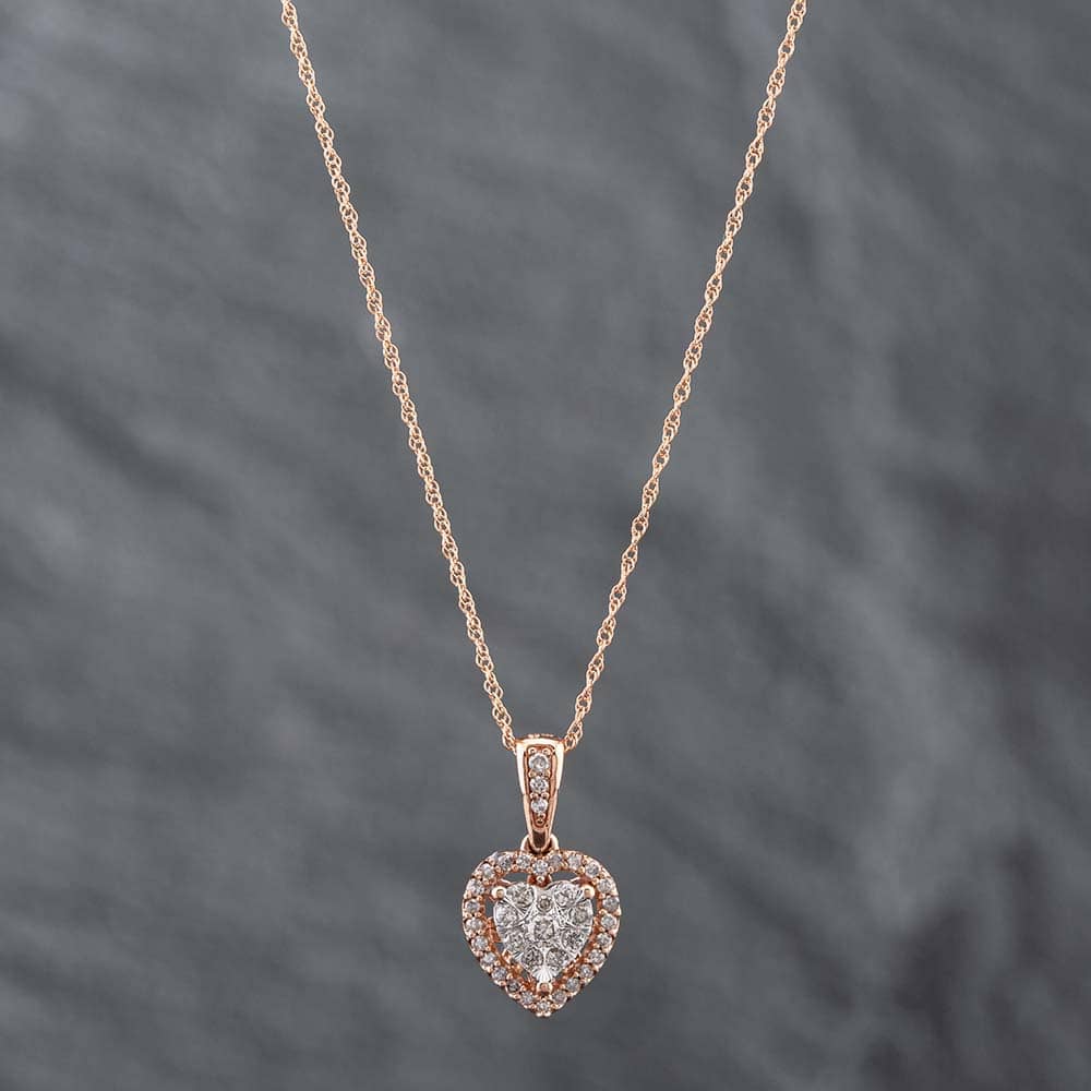 Product photograph of Pre-owned 9ct Two Colour Gold 0 25ct Brilliant Cut Diamond Halo Heart Pendant Amp 18 Inch Prince Of Wales Chain 43141160 from The Jewel Hut