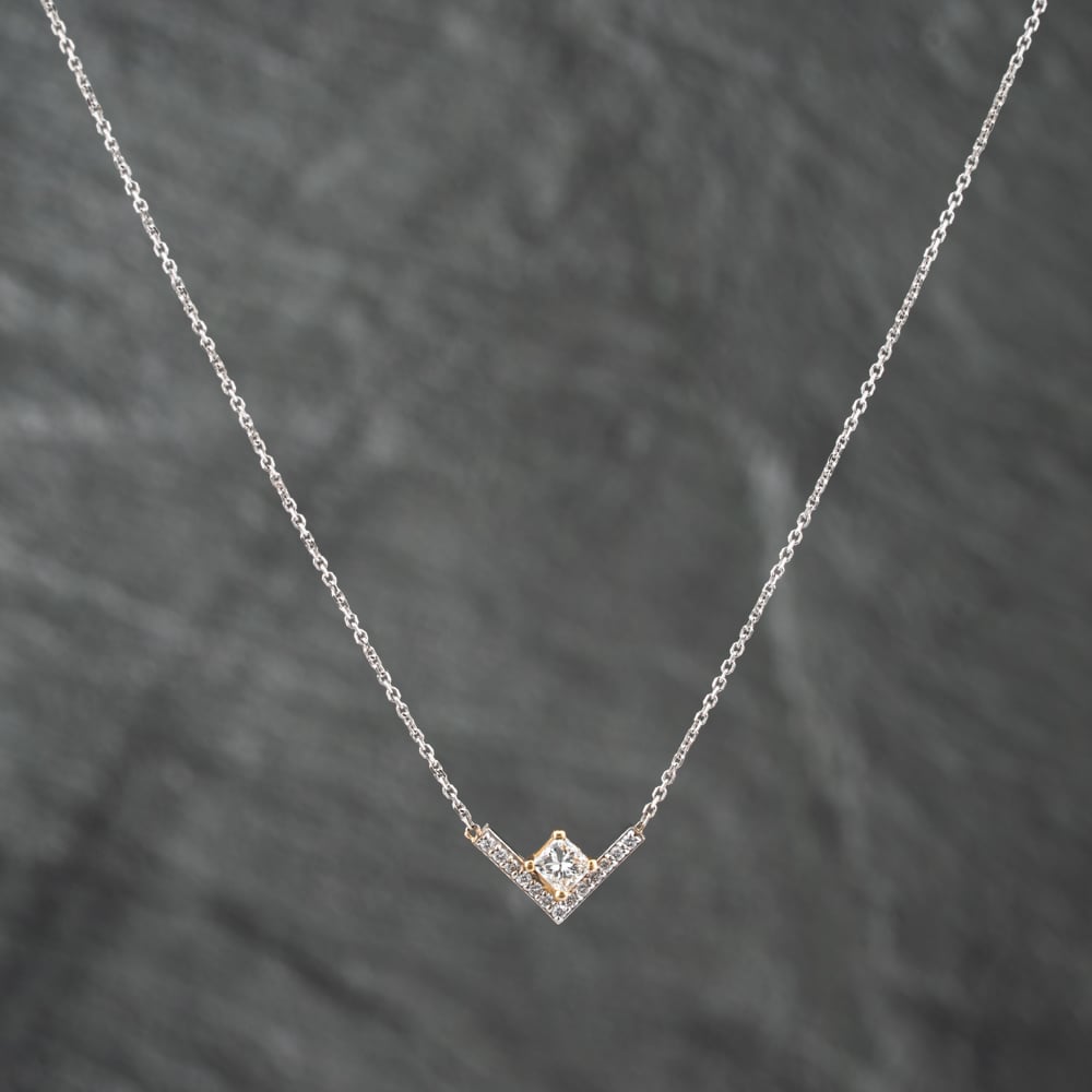 Click to view product details and reviews for Pre Owned 14ct Two Colour Gold 041ct Princess Cut Diamond V039 Shape Pendant And 16 Inch Trace Chain 43141210. Click to view product details and reviews for Pre Owned 14ct Two Colour Gold 041ct Princess Cut Diamond V039 Shape Pendant And 16 Inch Trace Chain 43141210.