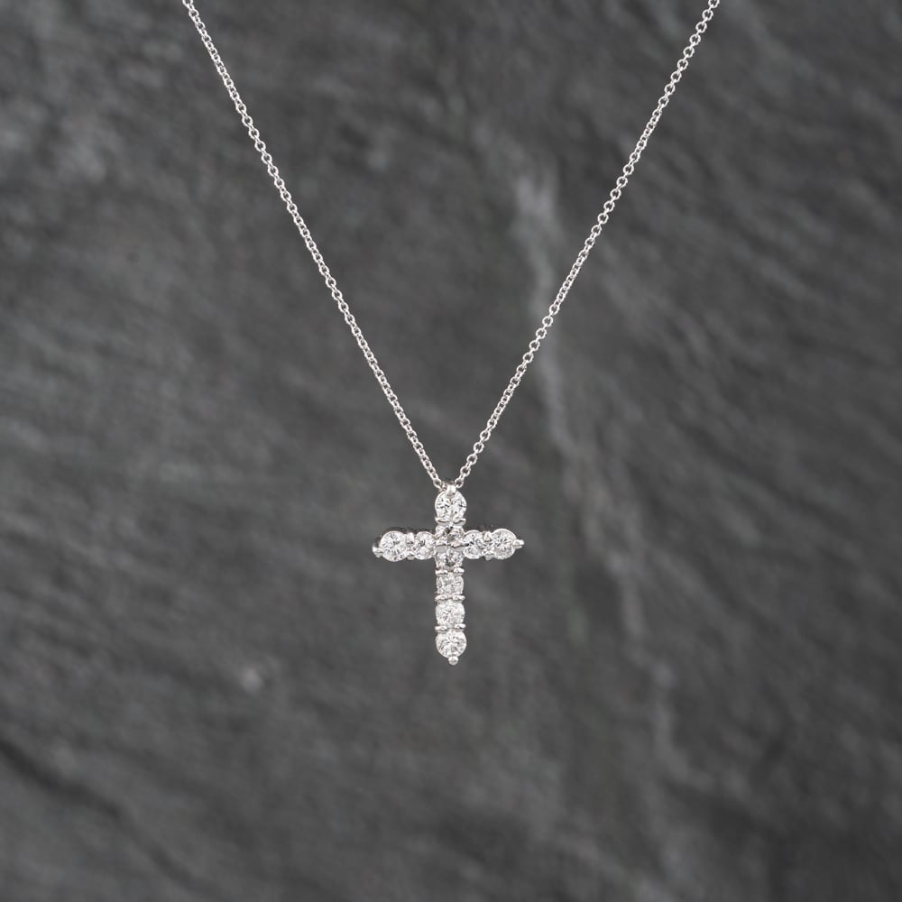 Click to view product details and reviews for Pre Owned Platinum 050ct Brilliant Cut Diamond Set Cross Pendant And 16 Inch Trace Chain 43141237.