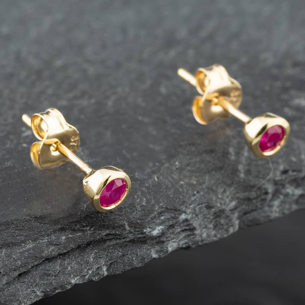 Product photograph of Pre-owned Yellow Gold 0 030ct Brilliant Cut Ruby Stud Earrings 43171062 from The Jewel Hut