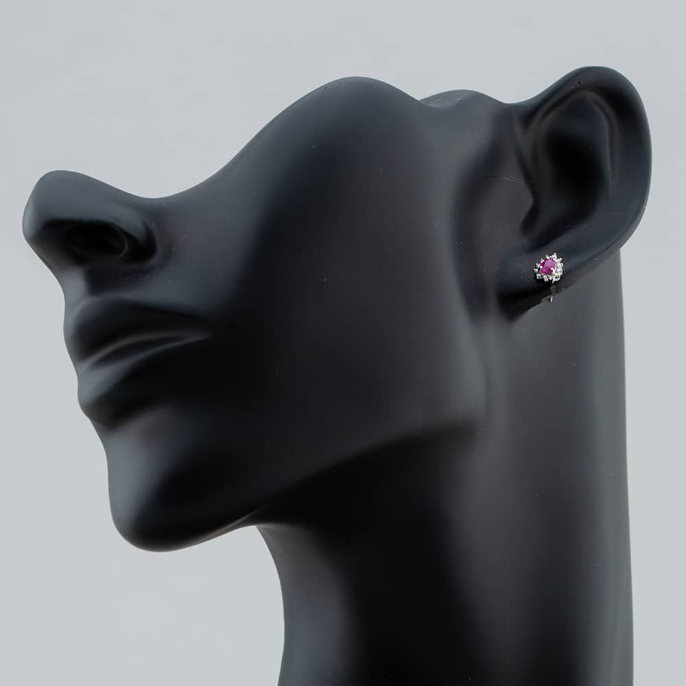 Pre-Owned White Gold 0.38ct Pear Cut Ruby & 0.09ct Brilliant Cut Diamond Cluster Stud Earrings 43171095