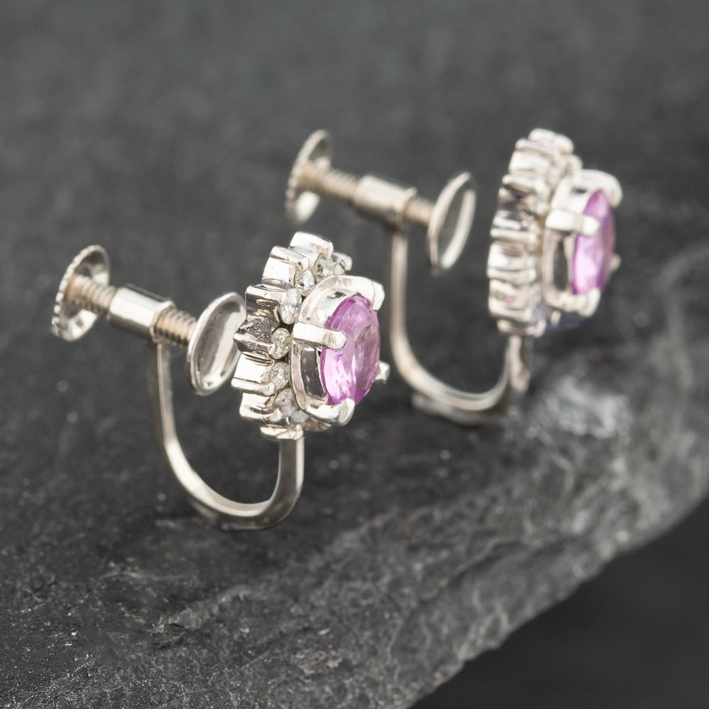 Product photograph of Pre-owned Platinum Certificated 0 62ct Pink Sapphire Amp 0 20ct Single Cut Diamond Oval Screw Fittings 8 7mm Stud Earrings 43171103 from The Jewel Hut