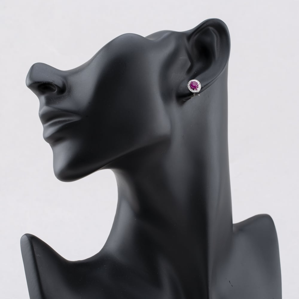 Pre-Owned 14ct White Gold 0.70ct Ruby & 0.25ct Diamond Oval 9mm Stud Earrings 43171229