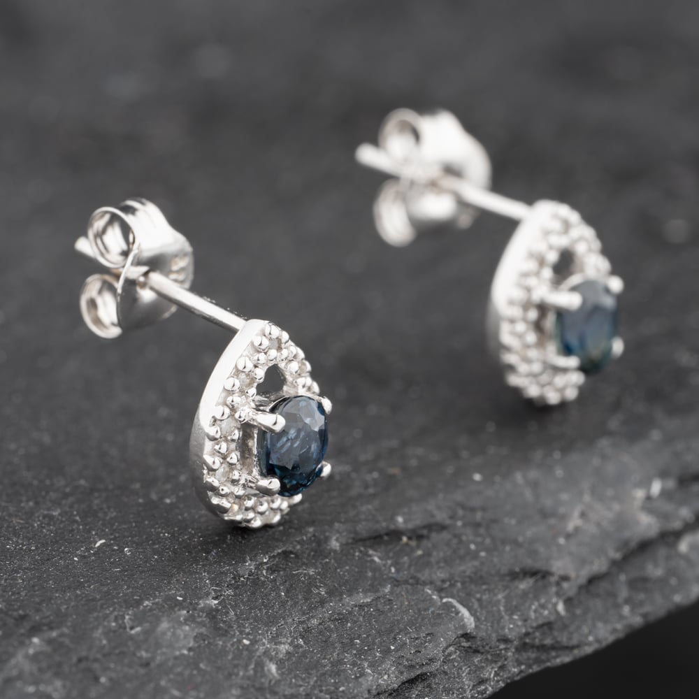 Click to view product details and reviews for Pre Owned 9ct White Gold 038ct Sapphire And Diamond Teardrop Cluster 85mm Stud Earrings 43171273.