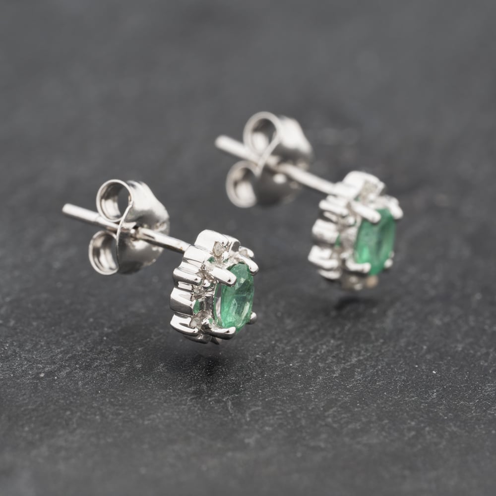 Click to view product details and reviews for Pre Owned 9ct White Gold 028ct Emerald And Diamond Cluster 7mm Stud Earrings 43171292.