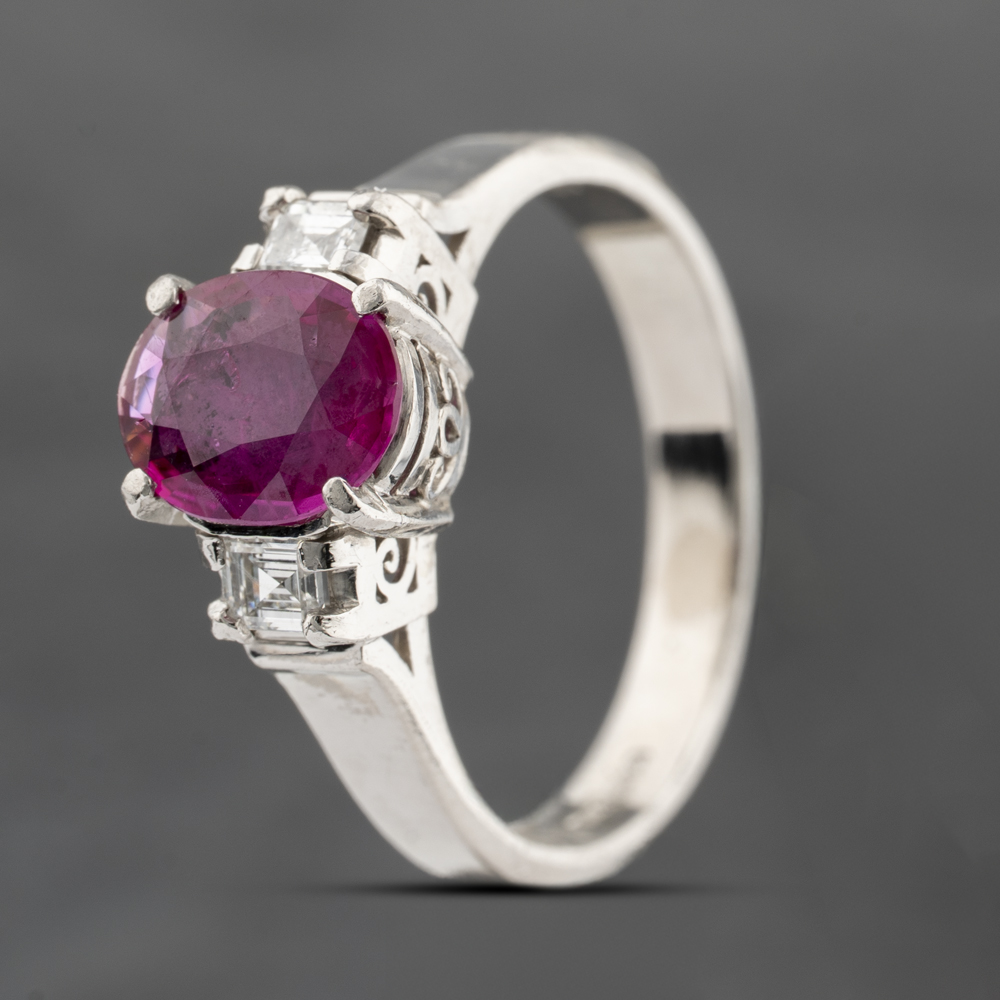 Click to view product details and reviews for Pre Owned Platinum 095ct Ruby And 018ct Diamond Three Stone Ring 43351040.