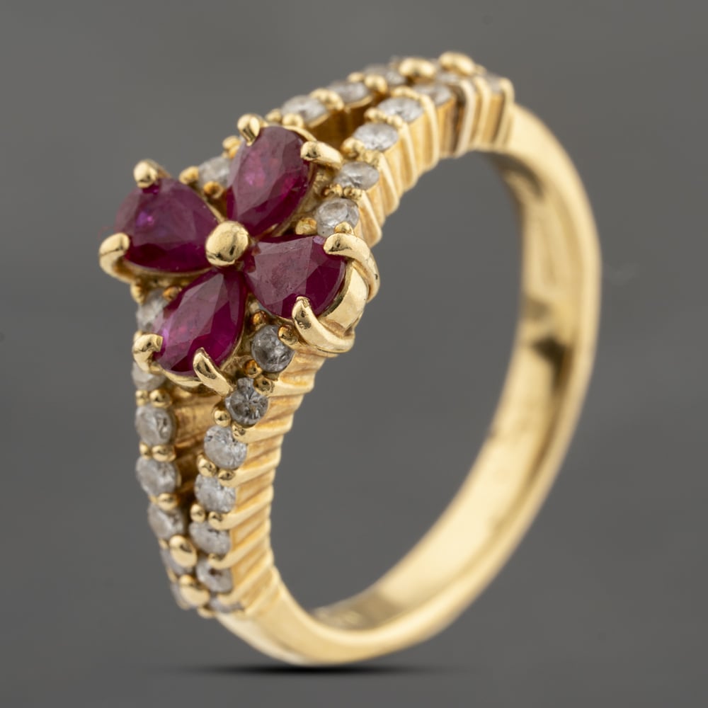 Click to view product details and reviews for Pre Owned 18ct Yellow Gold 084ct Ruby And 037ct Brilliant Cut Diamond Flower Dress Ring 43351058.