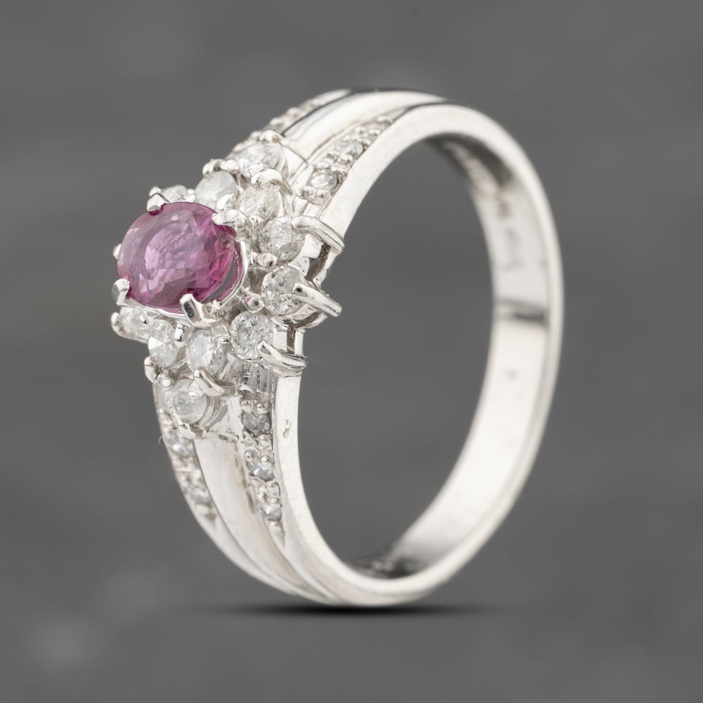 Click to view product details and reviews for Pre Owned Platinum 043ct Ruby And 036ct Diamond Oval Cluster Ring 43351062.