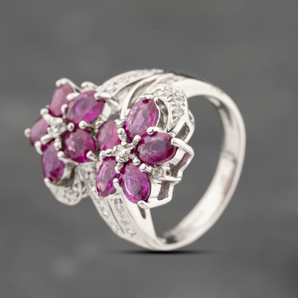Click to view product details and reviews for Pre Owned 18ct White Gold 284ct Ruby And 028ct Diamond Double Flower Cluster Ring 43351065.
