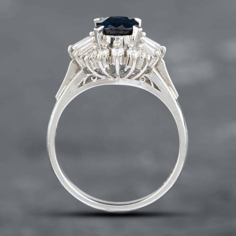 Pre-Owned Platinum 1.65ct Oval Cut Sapphire & 0.34ct Brilliant Cut Diamond Cluster Ring 43361013