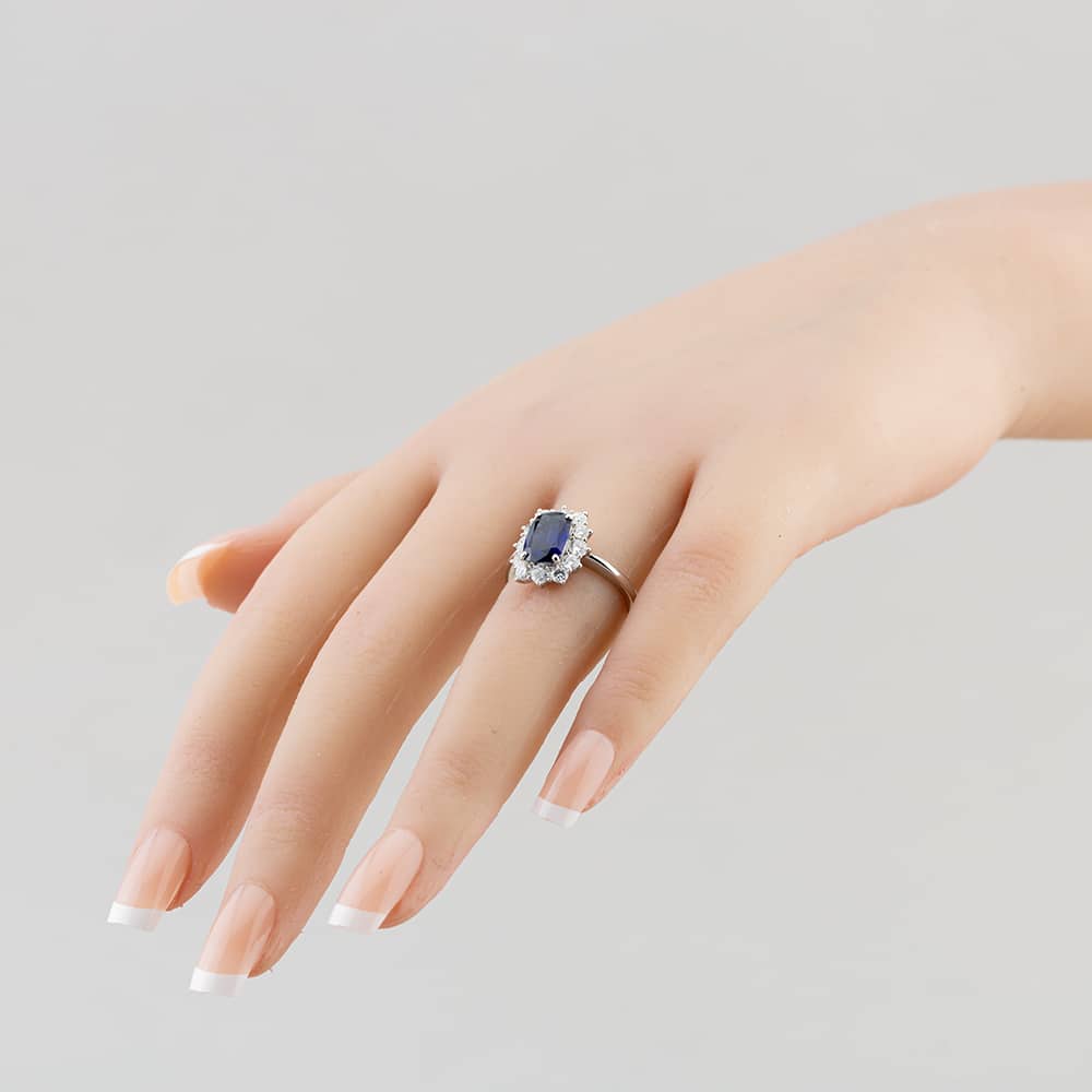 Pre-Owned Platinum 2.01ct Oval Cut Sapphire & 0.78ct Brilliant Cut Diamond Cluster Ring 43361061