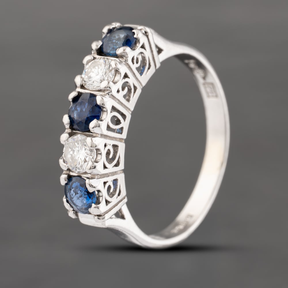 Click to view product details and reviews for Pre Owned Platinum 055ct Sapphire And 030ct Brilliant Cut Diamond Five Stone Ring 43361157.