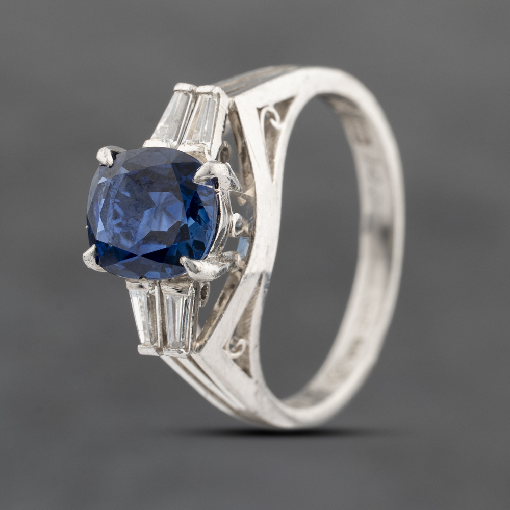 Click to view product details and reviews for Pre Owned Platinum Sapphire And 022ct Baguette Cut Diamond Oval Dress Ring 43361160.