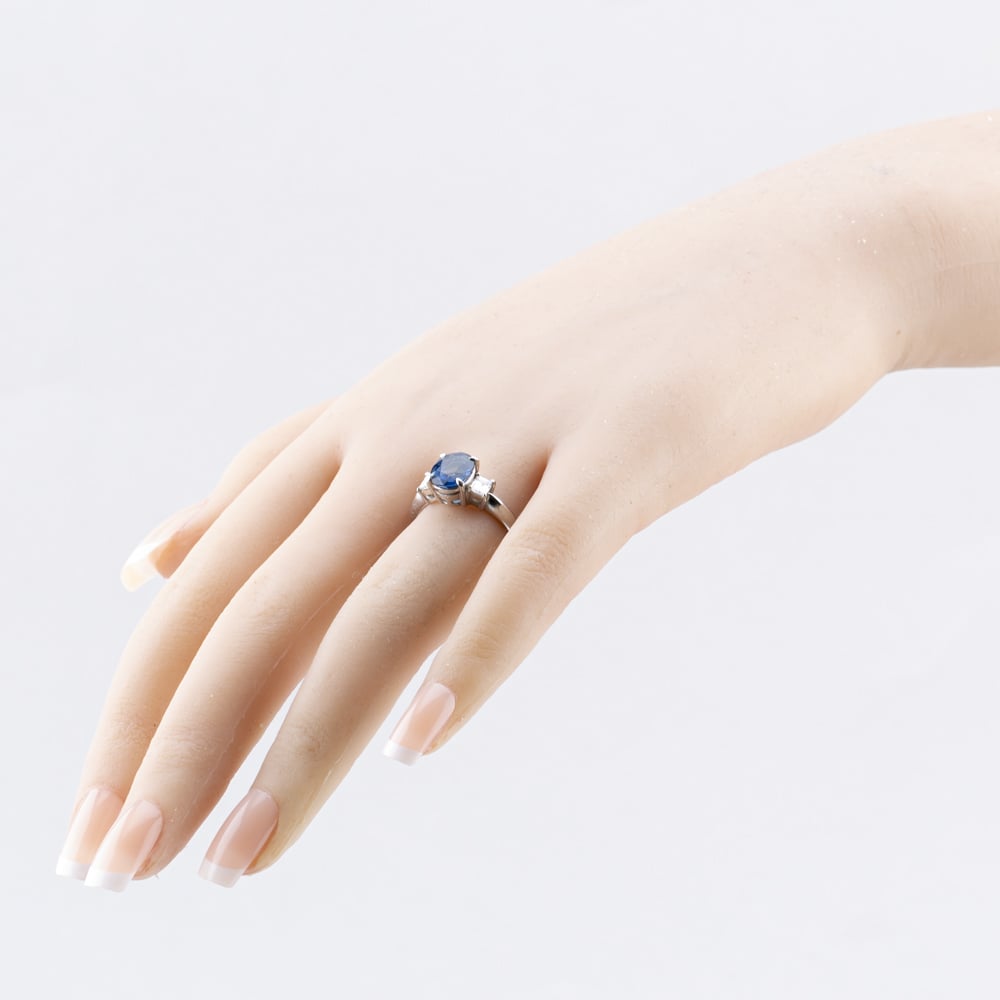Pre-Owned Platinum 2.41ct Sapphire & 0.38ct Step Cut Diamond Three Stone Ring 43361182